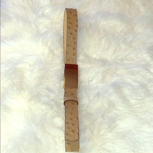 Tan leather belt with gold plated buckle